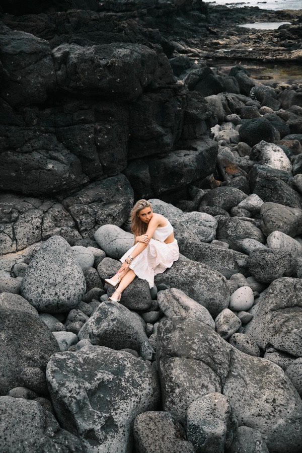 BLONDE — BLACK ROCKS &mdash; Portrait series shot on black volcanic rocks by the sea.
